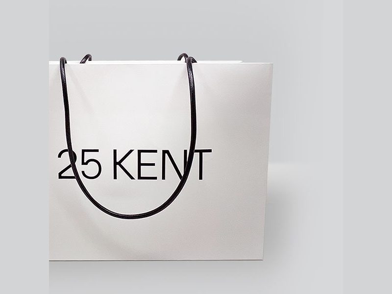 25 Kent white shopping bag with black rope handles by VSL Packaging