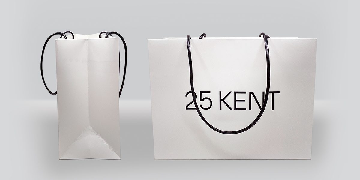 25 Kent white matte shopping bags with black rope handles by VSL Packaging