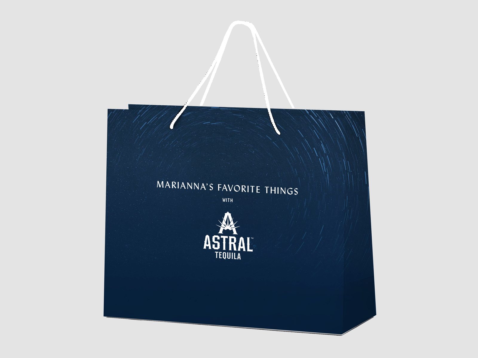 Astral Tequila navy laminated shopping bag with white rope handles by VSL Packaging