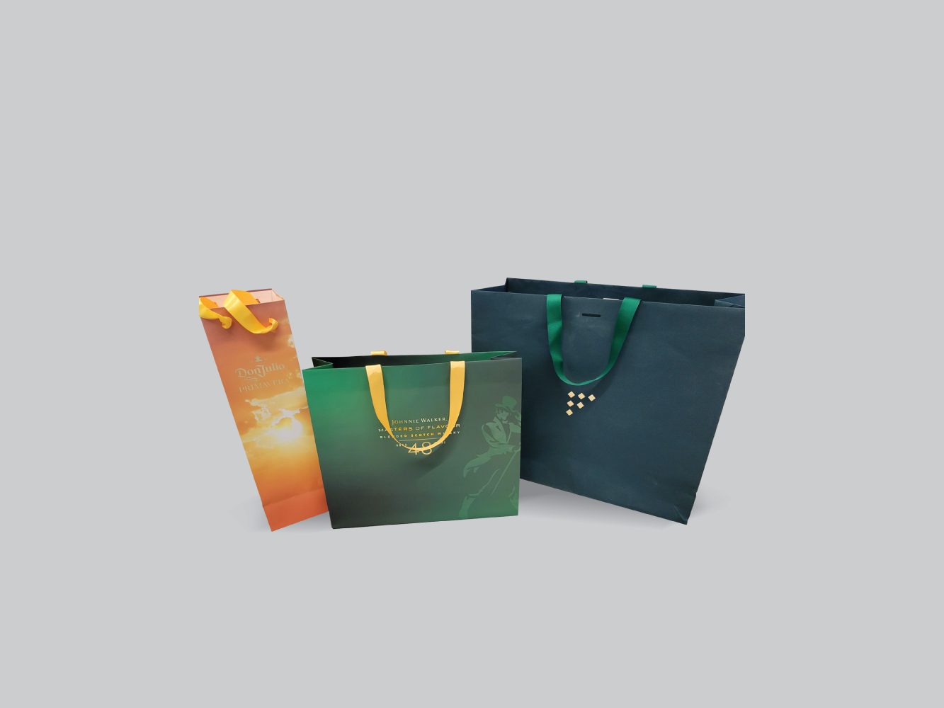 Gradient and green shopping bags with gold dot pattern by VSL Packaging