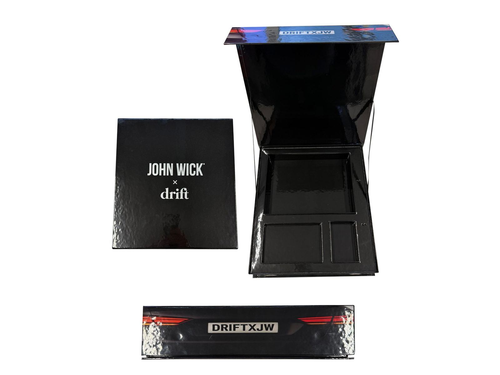 Black gloss rigid box with fitted insert and printed sleeve, John Wick × drift, by VSL Packaging