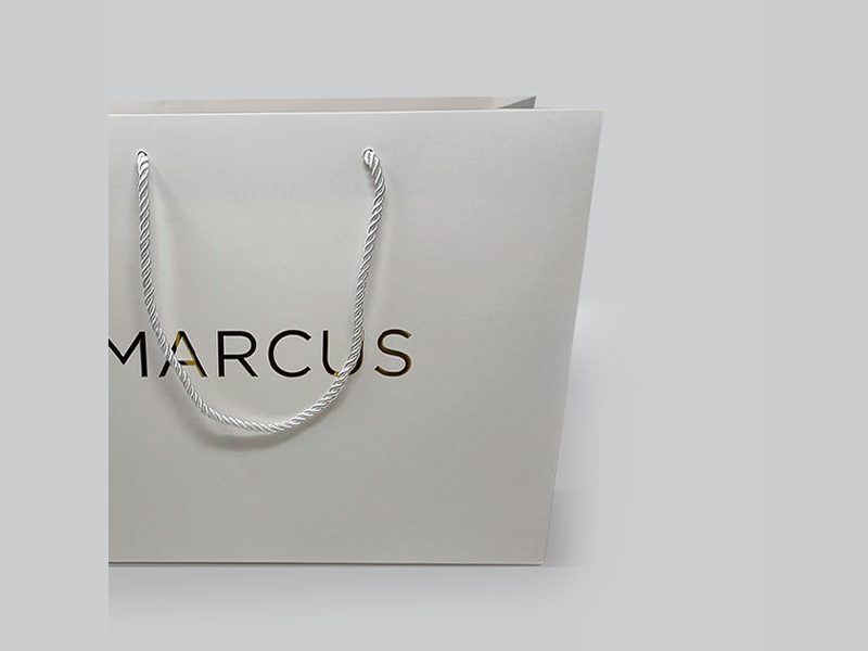 Marcus pearlescent white shopping bag with cord handles by VSL Packaging
