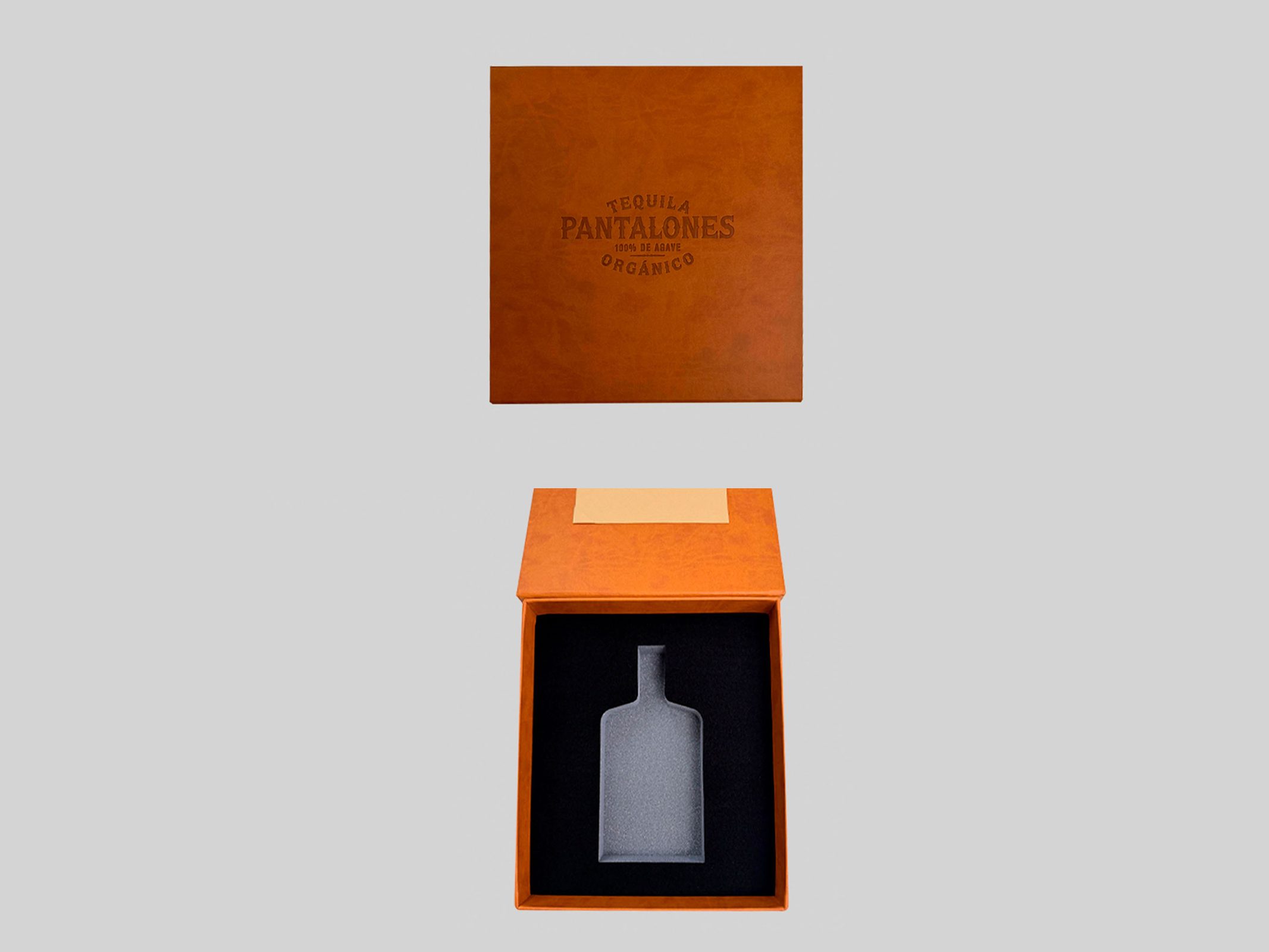 Pantalones Tequila orange rigid box, closed and open with a bottle insert, by VSL Packaging